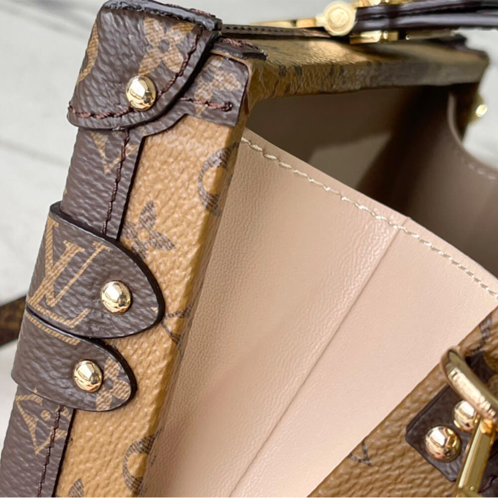 LV PETITE MALLE EAST WEST